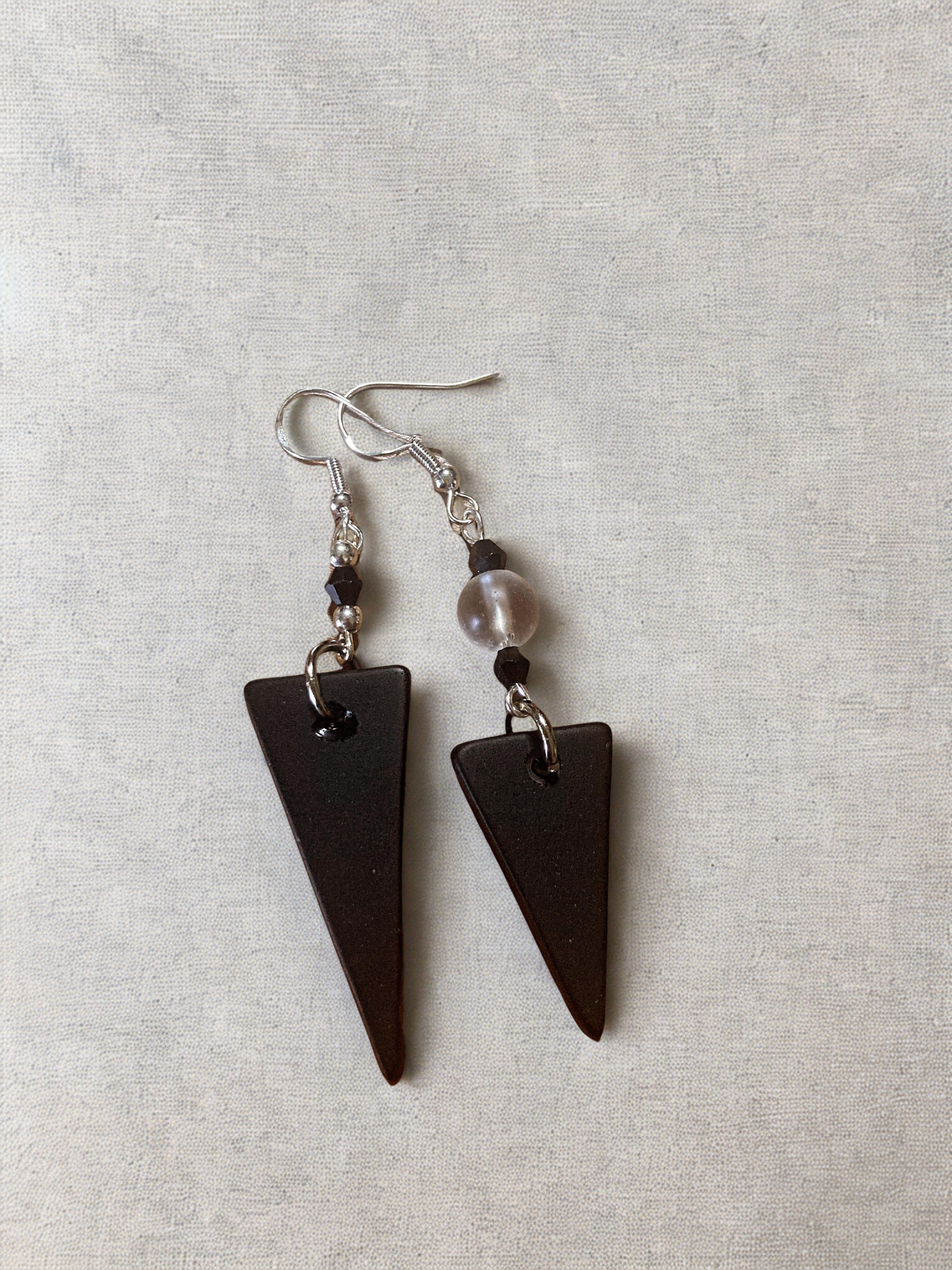 The Odd Pair earrings - black triangle stone drops with silver hardware