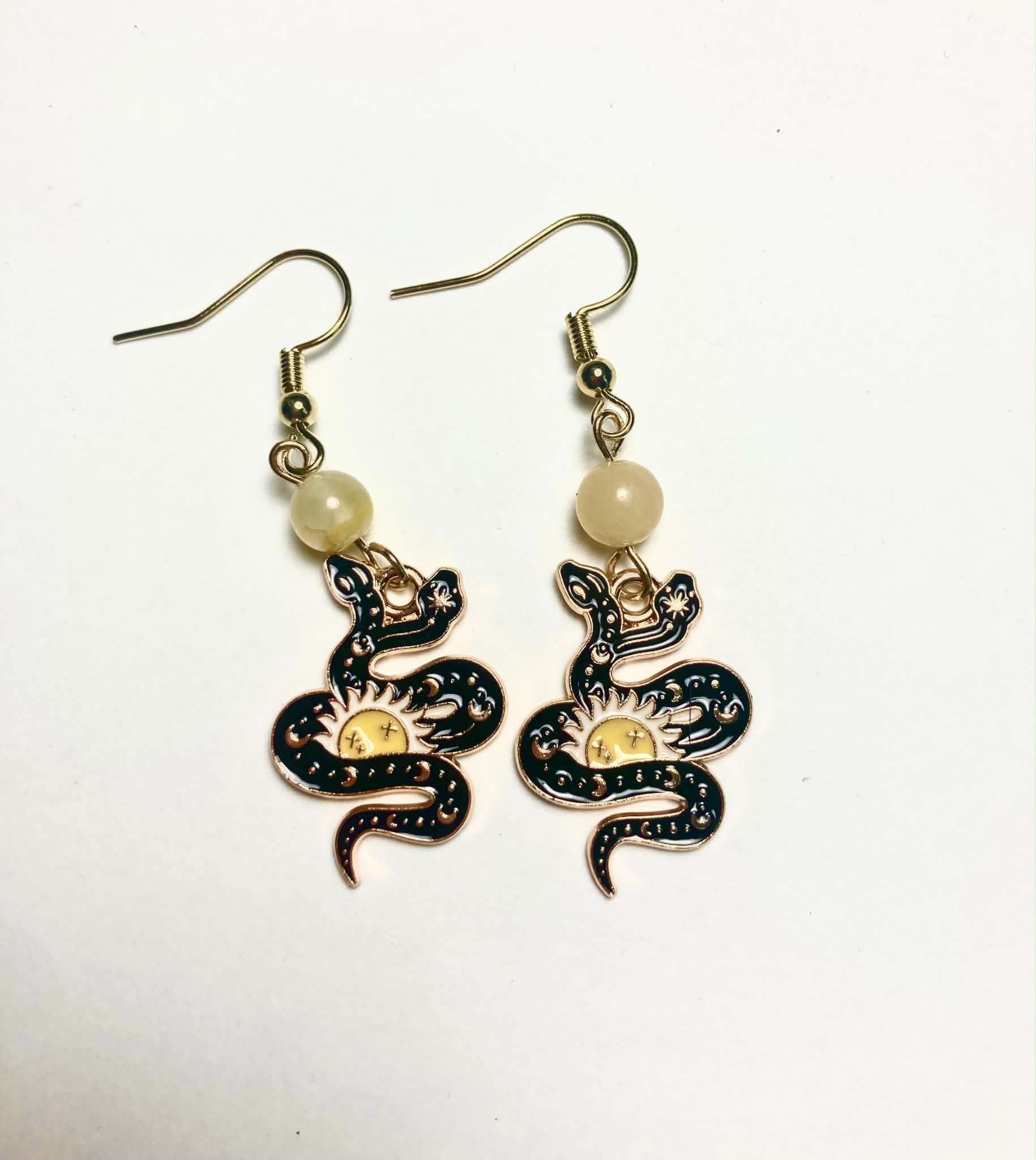 Dark enamel celestial serpent and sun drop earrings with citrine beads and 14k gold plated hooks