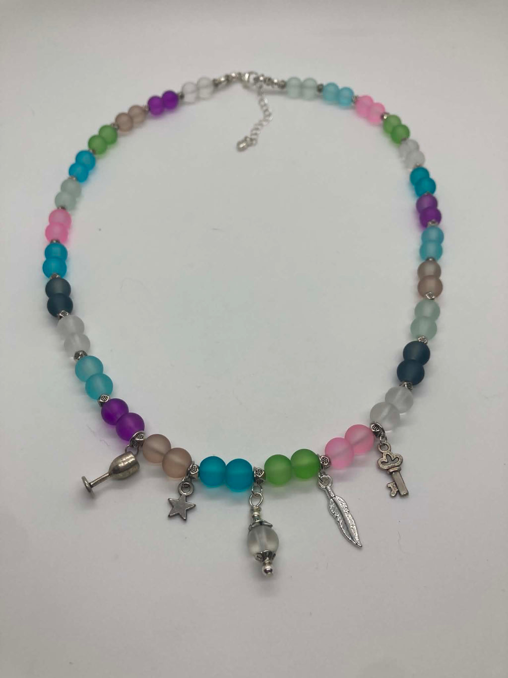 Tripping Billies Necklace - multicolor frosted glass bead necklace with silver charms, alternate angle