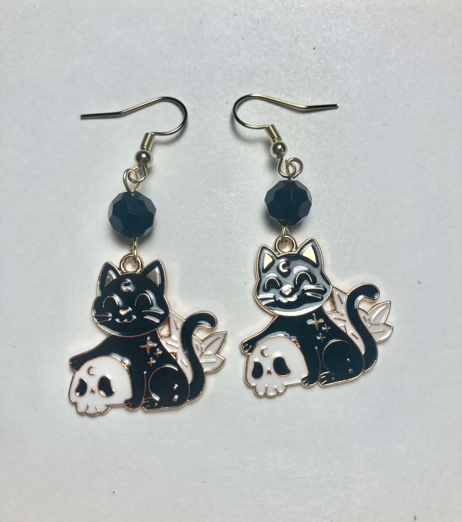 Midnight Familiar black cat skull gold enamel drop earrings with jet black glass beads
