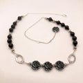 Black Rose Throne Necklace with Czech glass roses, jet beads, and silver findings on a delicate silver chain