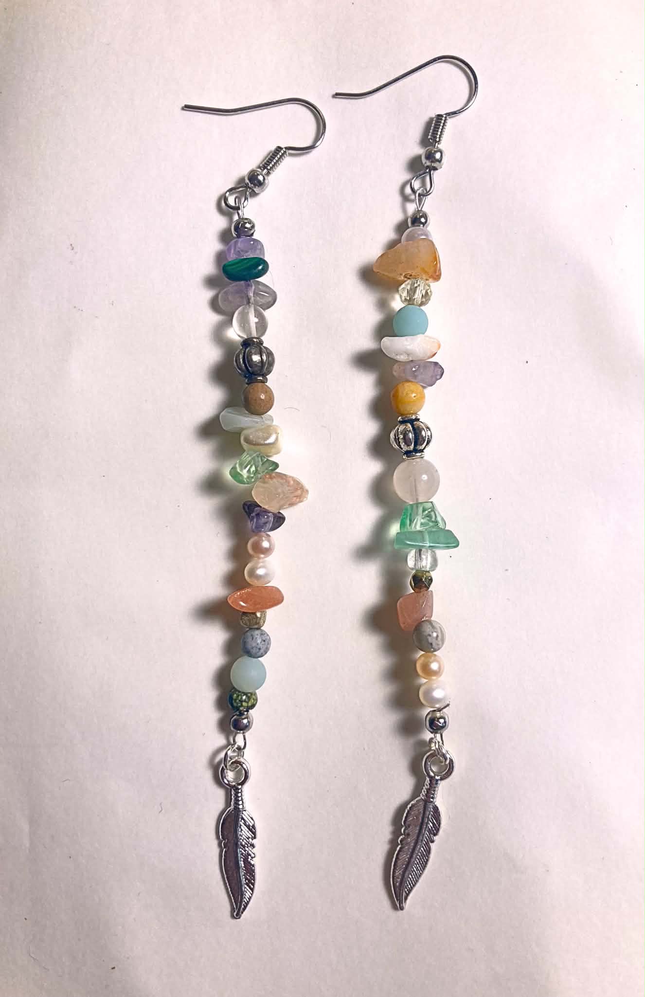 Feather and stone dangle earrings with mixed natural stone chips, pearls, silver beads, and feather charm