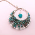 Sleeping Beauty Turquoise wire-wrapped moon hoop necklace with turquoise heart charm on silver chain