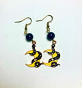 Dark enamel serpent and golden crescent moon drop earrings with black glass beads and 14k gold plated hooks