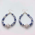 "Tide & Time" blue dolomite jasper hoop earrings with vintage 1960s white ceramic focal bead and sterling silver fish hooks