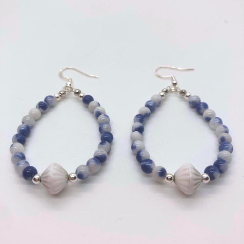 "Tide & Time" blue dolomite jasper hoop earrings with vintage 1960s white ceramic focal bead and sterling silver fish hooks