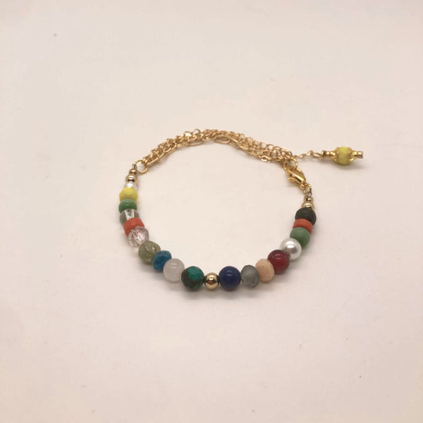 Colorful mixed gemstone bracelet with malachite, lapis lazuli, coral, African turquoise, jet, glass pearls and gold accent beads