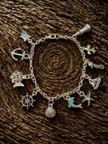 Silver Nautical Charm Bracelet with Blue Dolphin